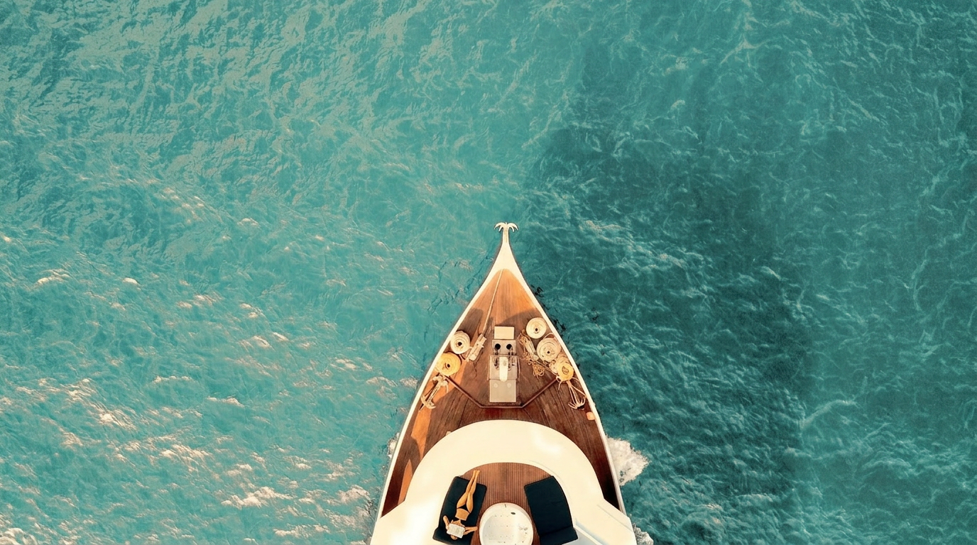 woman reading a book on the bow of luxury ship